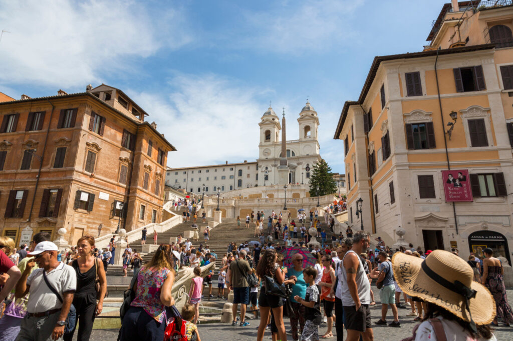 Travel stroller on cobblestone italy street rome